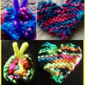 Hand knitted heart and butterfly pins